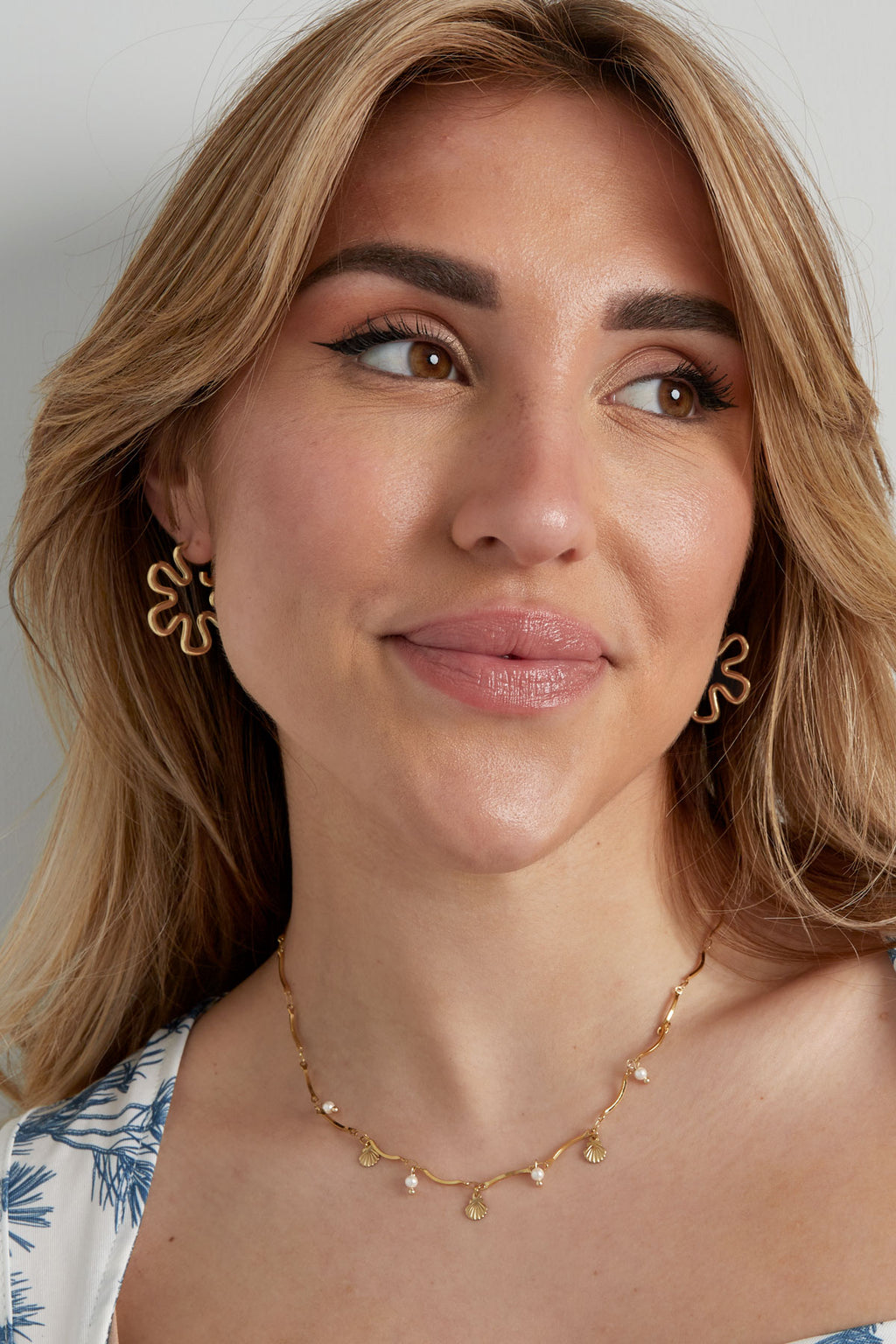 GoldAura™ Sculpted Bloom Earrings – Modern Gold Statement Design