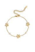 GoldAura™ Golden Floral Charm Bracelet – Stainless Steel Elegance